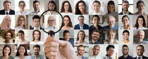 Employer hand holding magnifying glass choosing old female candidate — Stock Photo, Image