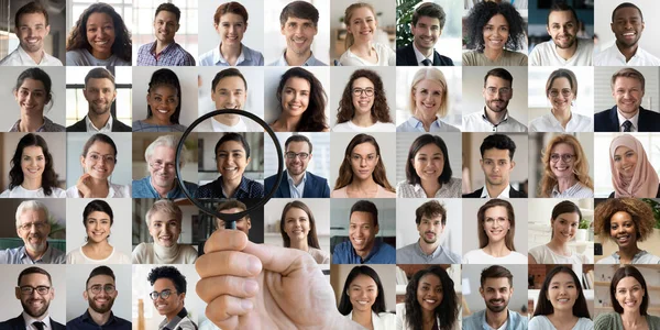 Hr manager holding magnifier choosing indian recruit among multiethnic faces — Stock Photo, Image