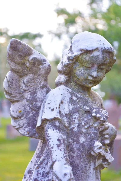 Figure of angel with wings.