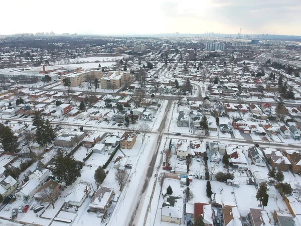 Snow view from the top with urban city, aerial photography over