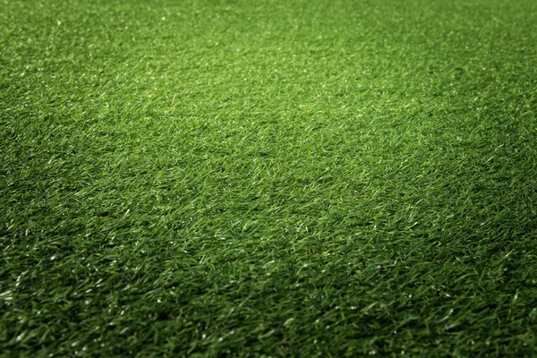 Штучний зелений фон текстури трави — стокове фото