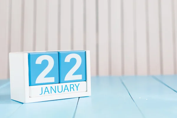 Január 22-én. Nap 22 hónap, naptár, fából készült háttér. Tél fogalma. Üres hely a szöveg — Stock Fotó