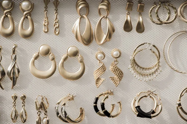 Náušnice, různé šperky krásné — Stock fotografie