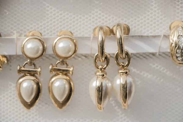 Náušnice, různé šperky krásné — Stock fotografie