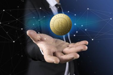 İş adamı bitcoin el üstünde tutan siyah takım elbise ile