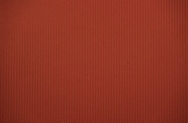 Koyu kırmızı renkli renkli karton doku arka plan olarak yararlı oluklu