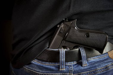 Adam Mavi Jeans için gizli silah arka yüzü