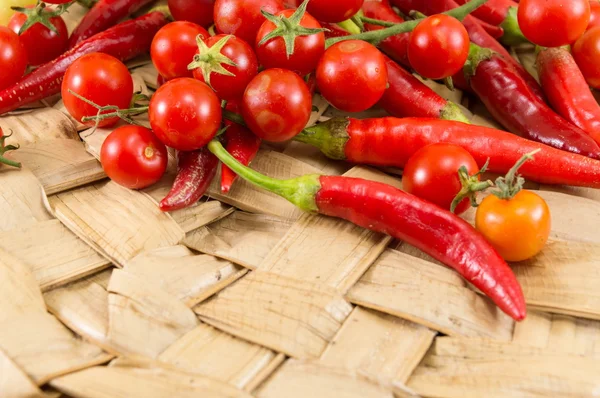 Red peppers and fresh cherry tomato — Stock Photo, Image