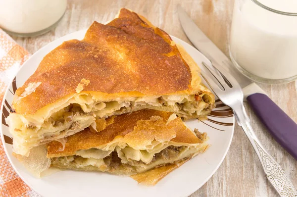 Cheese pie with a yogurt on a plate — Stock Photo, Image