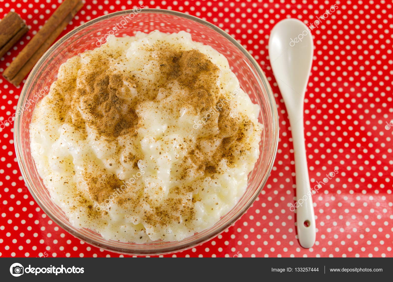 Rice milk dessert with cinnamon powder Stock Photo by ©CreativeFamily