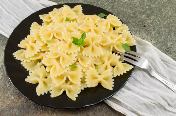 Bow tie farfalle pasta served on a plate — Stock Photo, Image