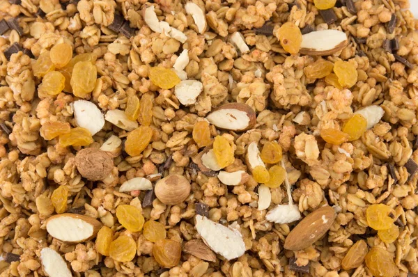 Granola cereales con fondo de fruta seca — Foto de Stock