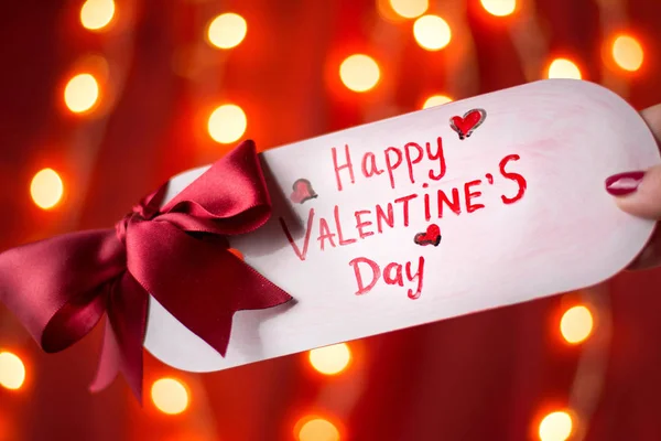 Happy Valentines day card against red background — Stock Photo, Image