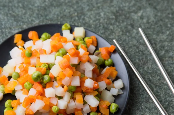 Cooked vegetables on a plate — Stock Photo, Image