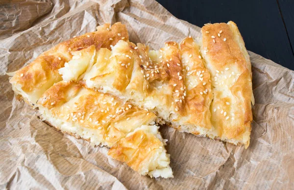 Cheese pie covered with sesame — Stock Photo, Image