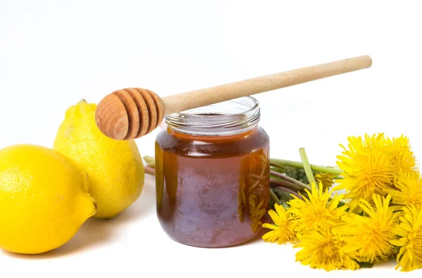 Dandelion honey and fresh flowers — Stock Photo, Image