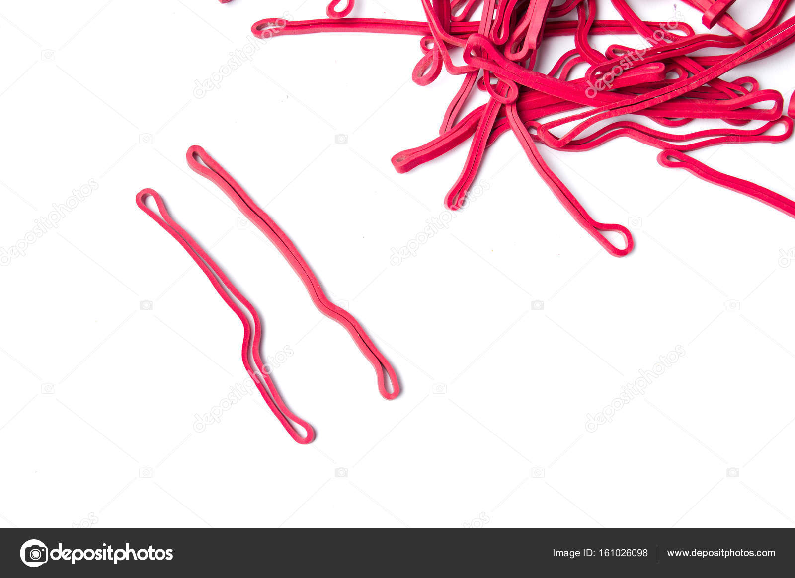 Red rubber bands isolated on white Stock Photo by ©CreativeFamily 161026098