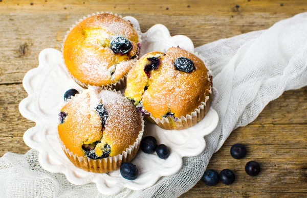 Homemade blueberry muffins on a wooden table — Stock Photo, Image