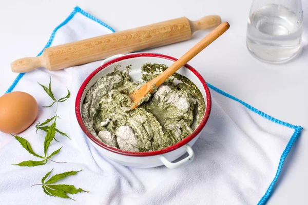 Dough made of mixed marijuana and wheat flour in a bowl — Stock Photo, Image