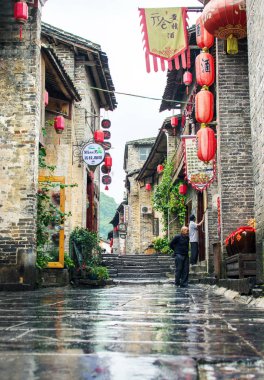 HUZHOU, CHINA - MAY 3, 2017: Huang Yao Ancient Town in Zhaoping county, Guangxi  clipart
