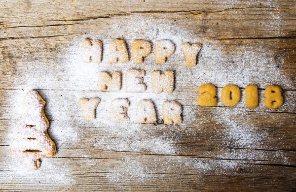 Ευτυχισμένο το νέο έτος σημείωμα γραμμένο με μπισκότα — Φωτογραφία Αρχείου