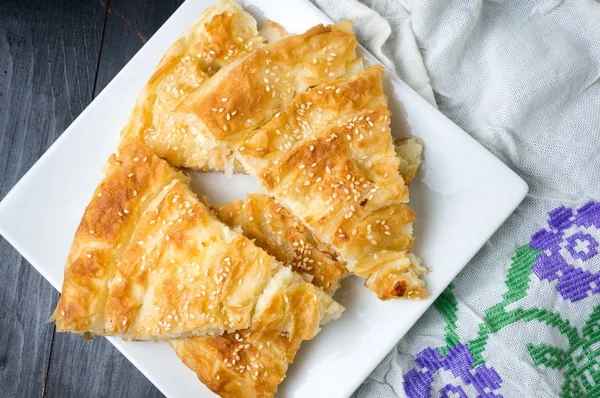 Cheese pie covered with sesame — Stock Photo, Image