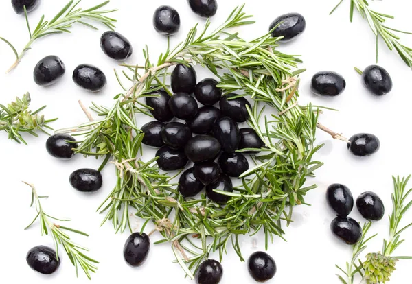 Dark olives and rosemary plant — Stock Photo, Image