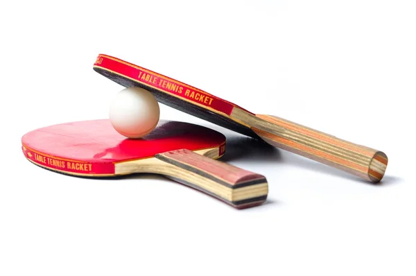 Two table tennis rackets and a ball isolated — Stock Photo, Image