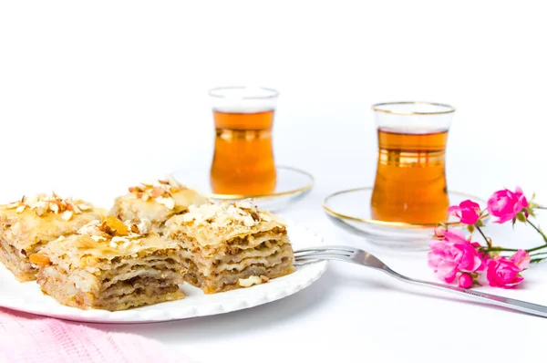 Baklava and turkish tea on white background — Stock Photo, Image