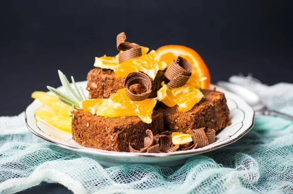 Chocolate cake with orange on a plate — Stock Photo, Image