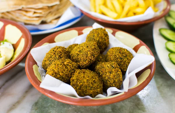 Felafel balls in a rustic bowl — Stock Photo, Image