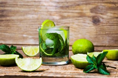 Green lime and mint cocktail with ice clipart