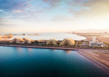 Marjan Island in Ras al Khaimah emirate in the UAE aerial view clipart
