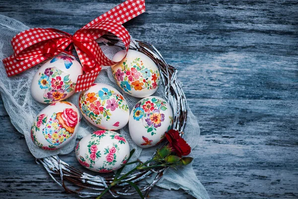 Decoupage decorated Easter eggs with flower pattern for a happy holiday