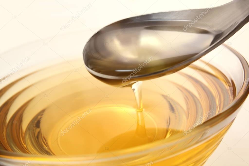 Oil with spoon
