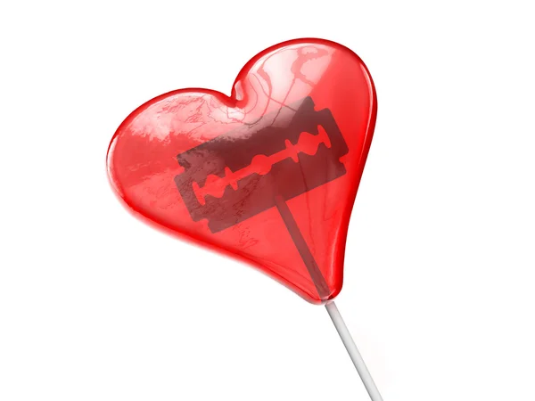 Red heart shaped lollipop with shaving blade inside — Stock Photo, Image