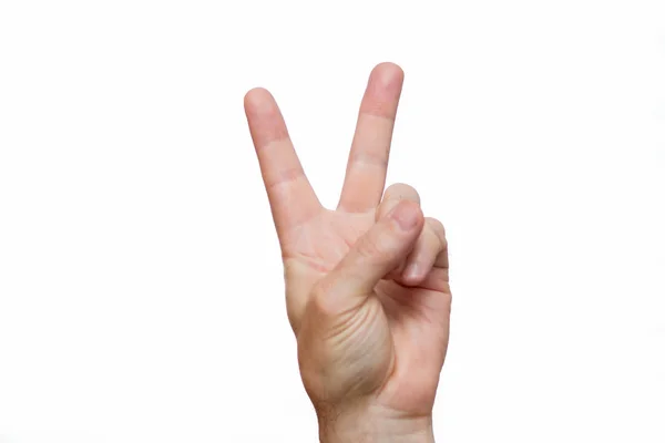 elinde iki parmak dön uzatılır