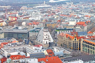 Aerial view of the history center city of Leipzig with St. Thomas's Church (Thomaskirche), Commerzbank and central stadium. View from Neues Rathaus. December 23, 2019 year. 