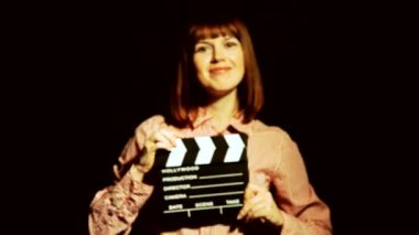 Bir film filme. O bir film clapper tokat