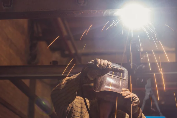 Welding machine. The man works as a welding machine — Stock Photo, Image