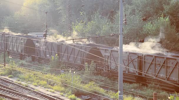 Coal. Wagons with burning coal go to the plant — Stock Video