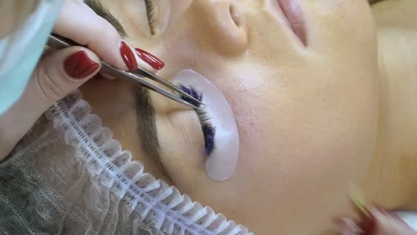 Eyelash extension. Procedures for eyelash extension — Stock Video