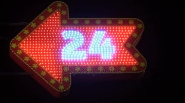 Parlayan bir tabela. Günde 24 saat çalışır