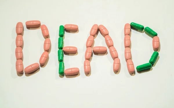 Tablety a smrt. Prášky na smrtelném loži — Stock fotografie