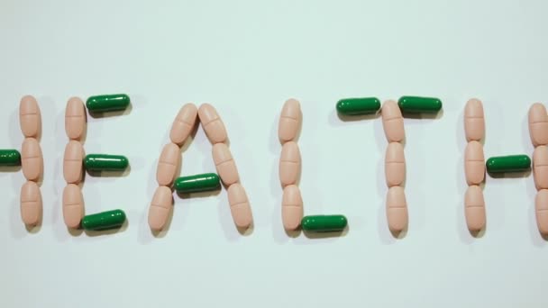 Piller Tabletter Som Anges Ordet Hälsa — Stockvideo