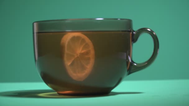 Tea Cup Filled Boiling Water Lemon Tea Leaves — Stock Video