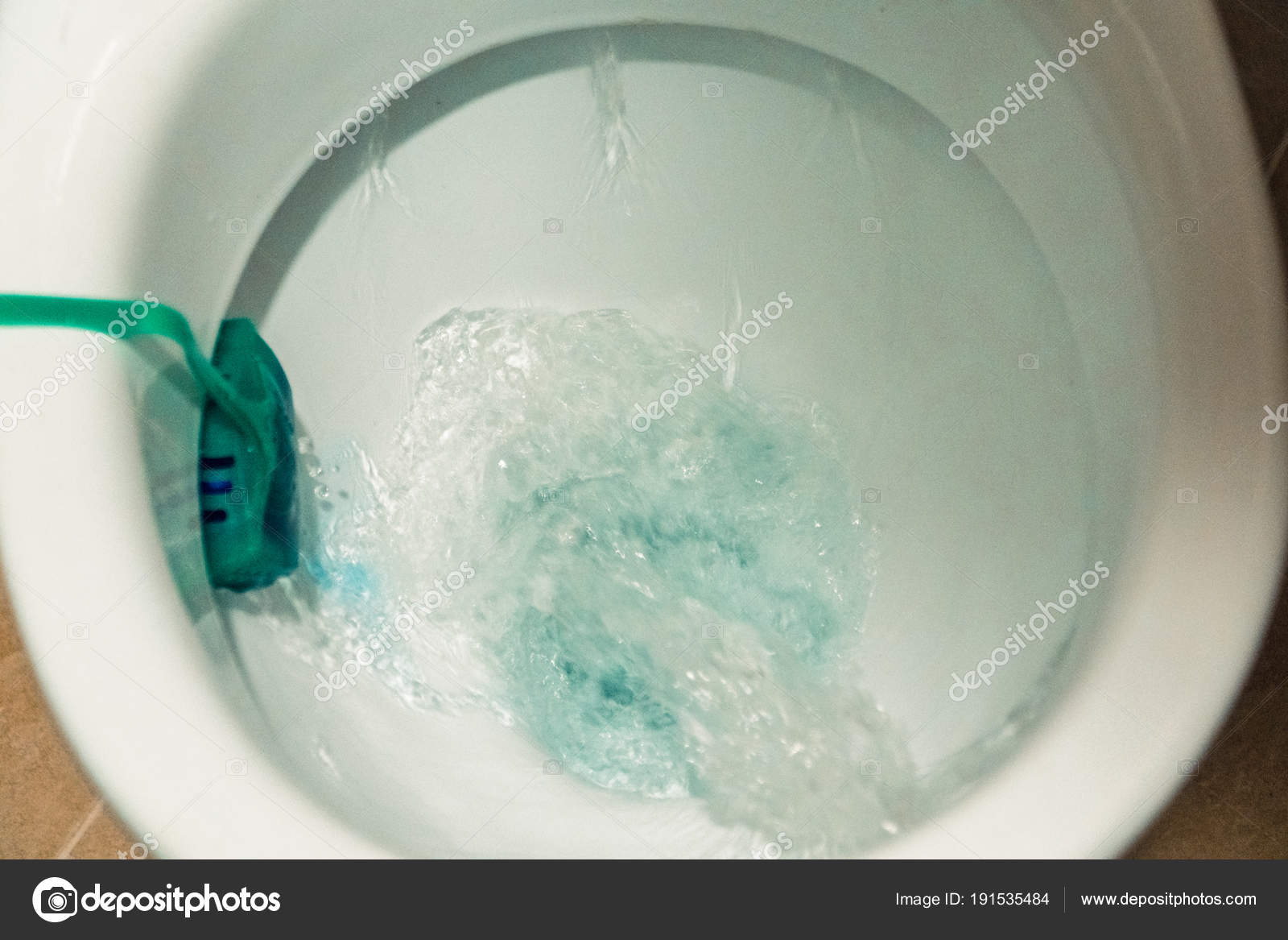 Restroom. Flushing water in the toilet Stock Photo by ©liukov 191535484
