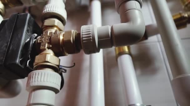 Water pipes. Water supply system and boiler houses in a private house. — Stock Footage Water Pipes Water Supply System Boiler Houses Private House Stock Footage