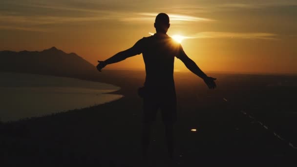 Journey Guy Stands Top Mountain Looks Sunset — Stock Video