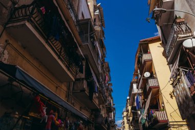 Residential buildings in Italy. On the balconies to dry things.